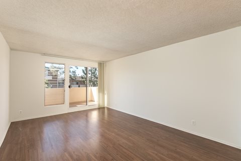 Living Room with Hardwood Floors and Patio Doors